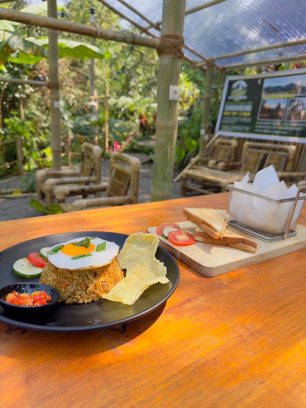 Food on the table with bamboo garden backdrop